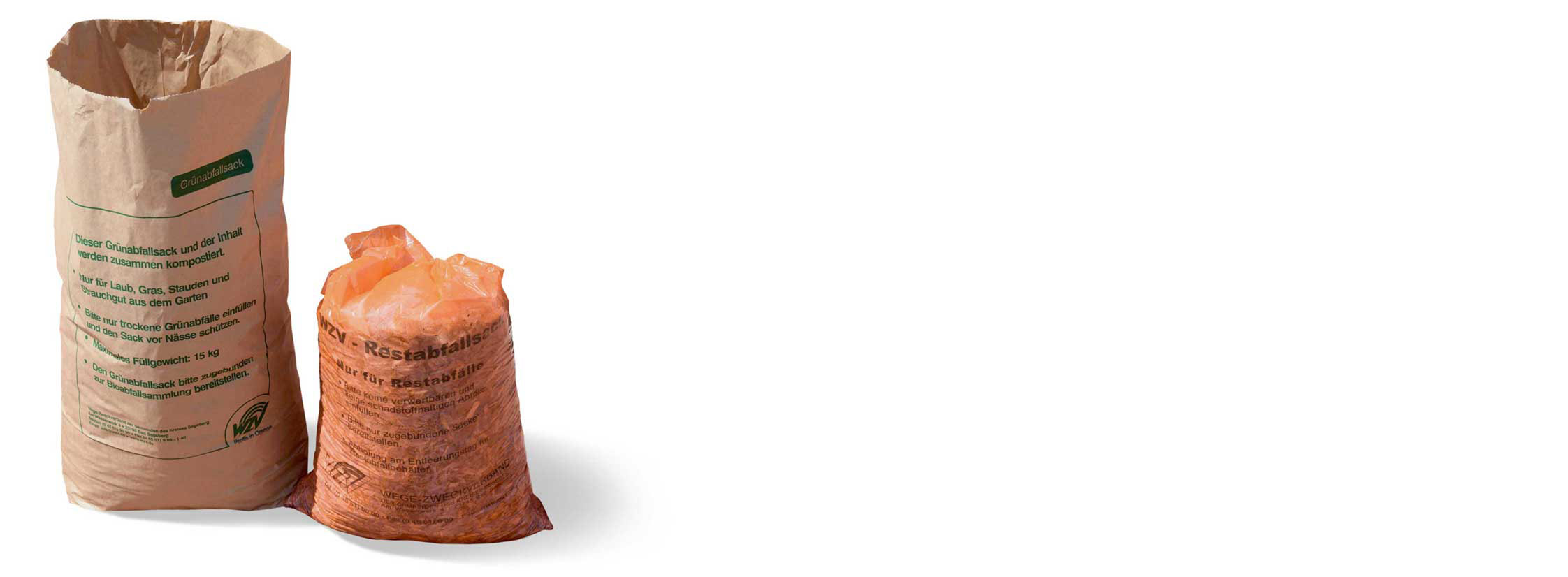 Ein Foto eines 110 Liter Restabfallsacks neben einem 80 Liter Grünabfallsack.